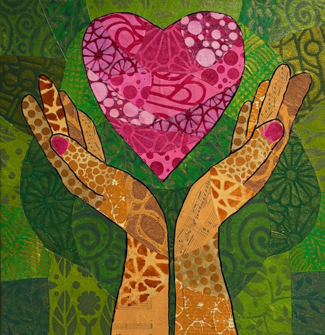 two hands embracing a pink and majenta heart