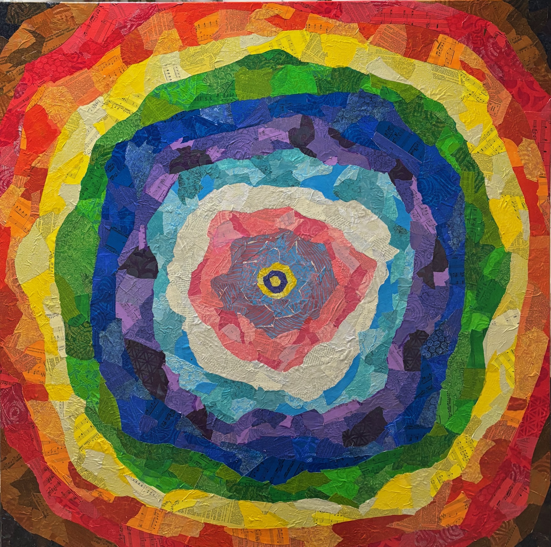a blossom and a target at once in rainbow colors