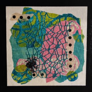 spider on web with colorful collage behind